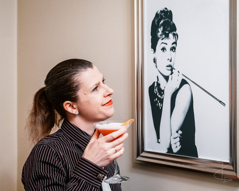 Enjoying a My Fair Lady cocktail with the elegant Audrey Hepburn