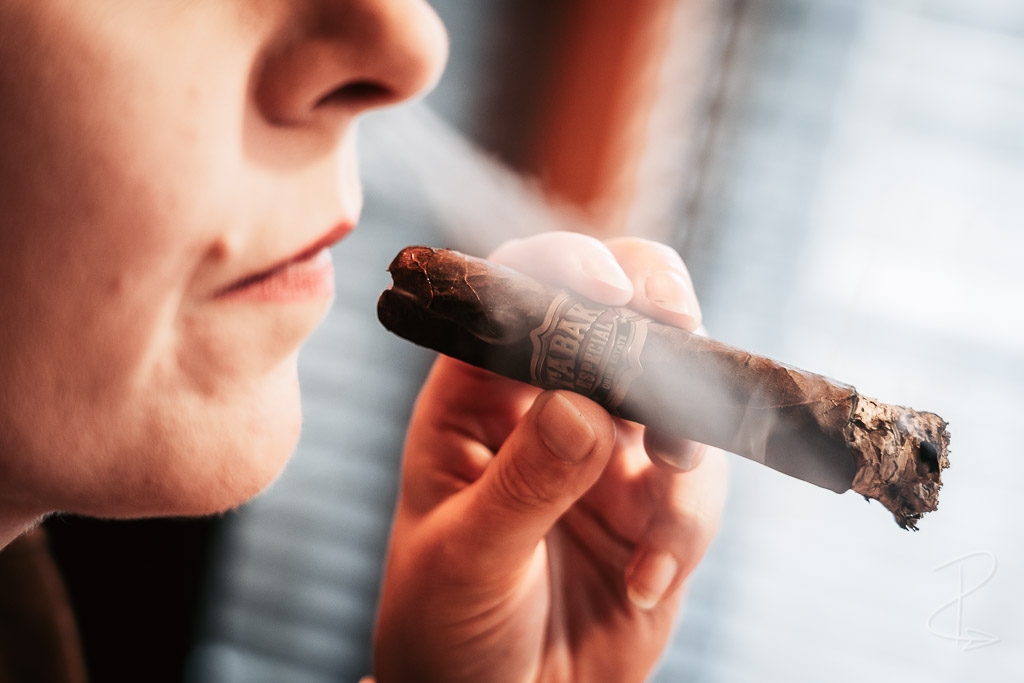 Retrohaling the smoke from a Drew Estate Tabak Especial Robusto Oscuro cigar