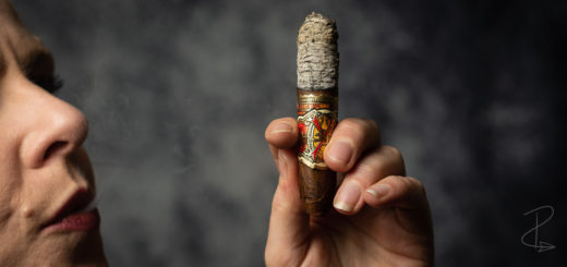 Admiring the beautiful long ash on the Arturo Fuente Opus X Love Affair perfecto cigar